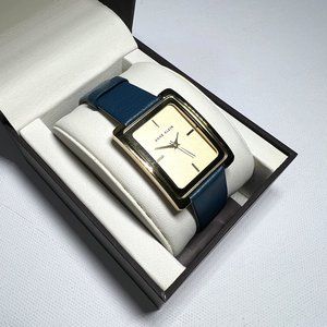 Anne Klein Gold tone and blue leather band watch
